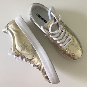 Gold converse sneakers